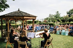 Outdoor ceremony in the Rose Garden at Nettlestead Place